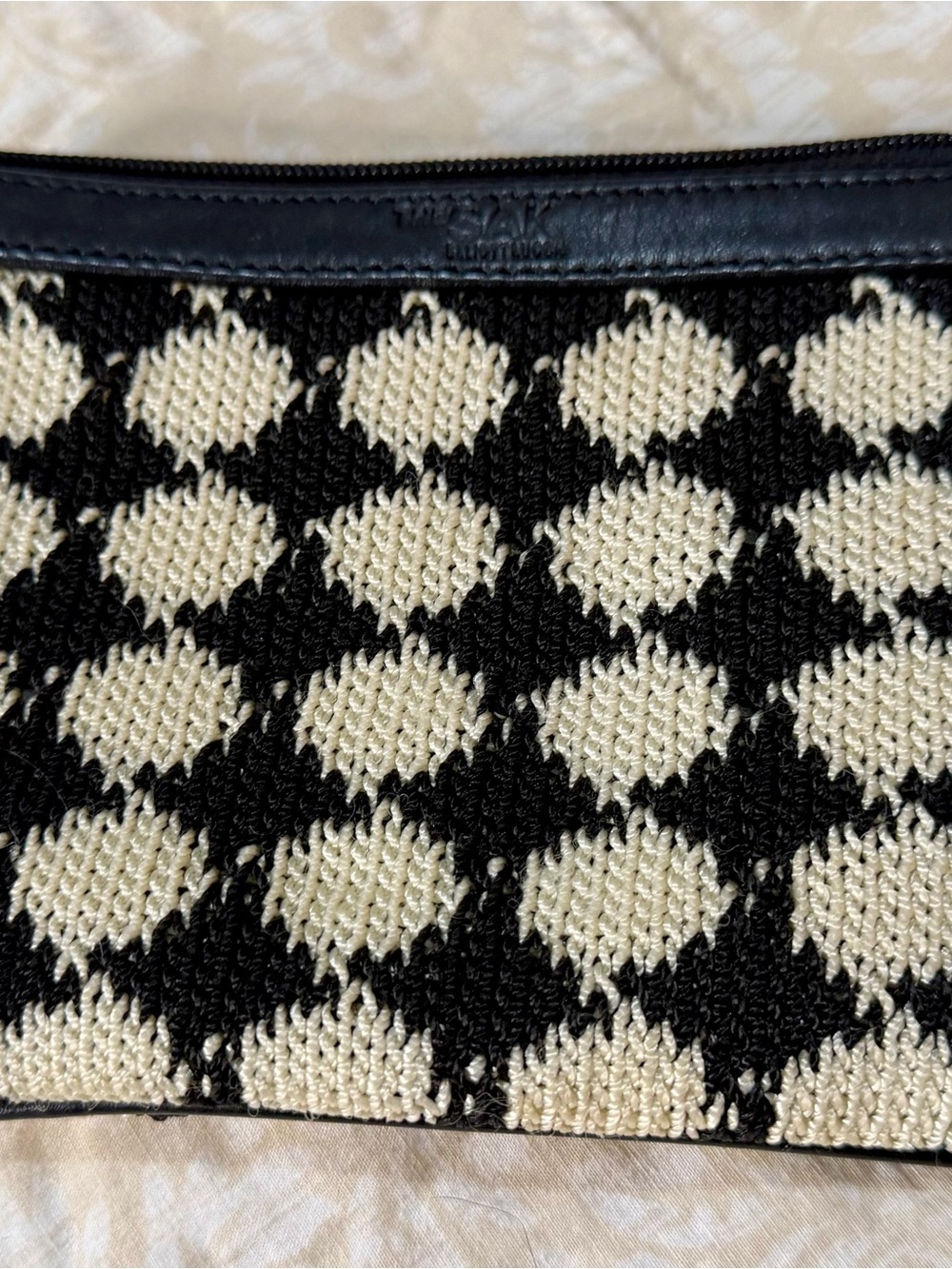The Sak Black and Cream Knit Geometric Cosmetic Pouch